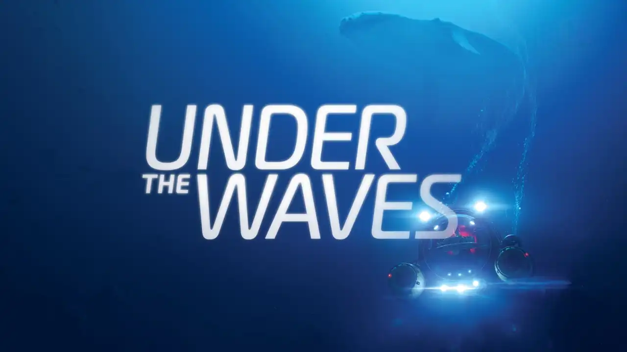 Under the Waves logo over a deep blue ocean with a small submersible and a whale in the background