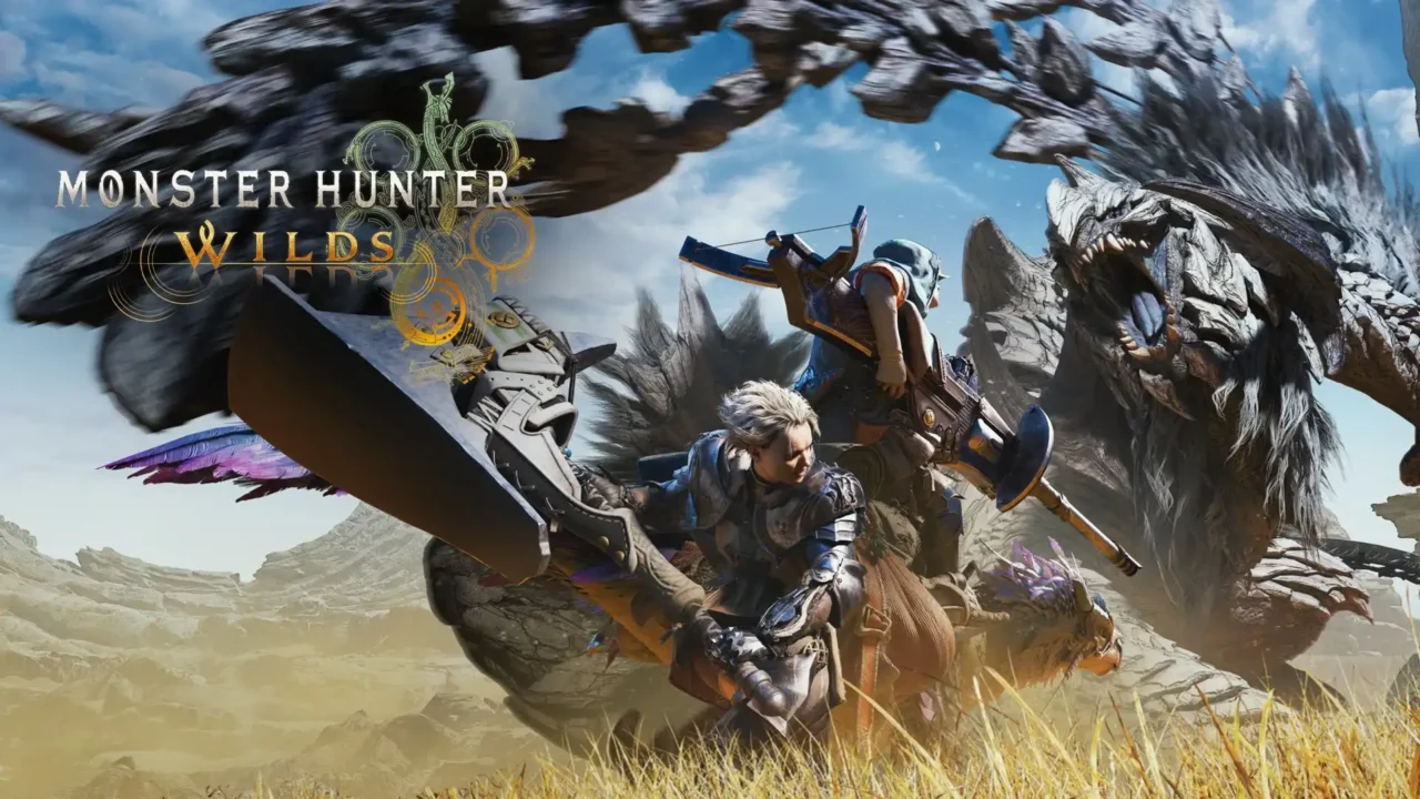 Monster Hunter Wilds key art with a hunter bracing behind a massive blade as a wyvern charges across a windy desert.