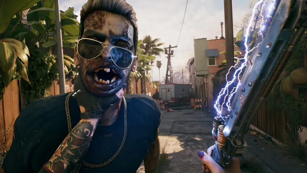 A close-up of a grotesque zombie with tattoos and sunglasses, holding an electric weapon in Dead Island 2 SoLA DLC.
