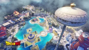 Same as above: Aerial view of the Dragon Ball theme park highlighting the floating Korin’s Tower ride, lakeside Kame House, and colorful pavilions surrounded by lush forest.