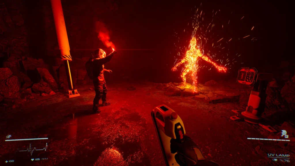 Player confronts burning alien figure in red-lit cave with UV lamp in Level Zero Extraction