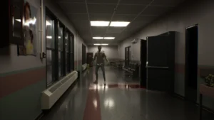 a man in dimly lit hospital hallway