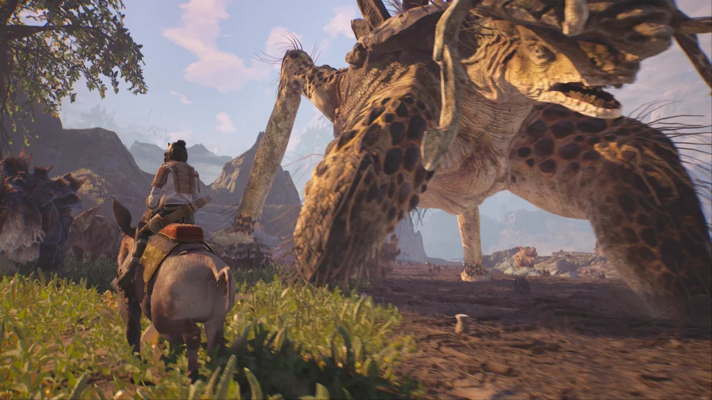 Player on mount passing under the leg of a massive ancient creature in Towers of Aghasba