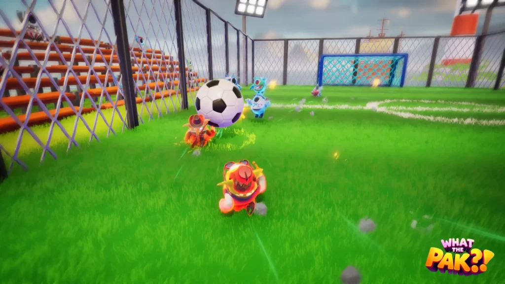 WHAT THE PAK?! mini-game with players on a bright green lawn dodging hazards in an outdoor arena