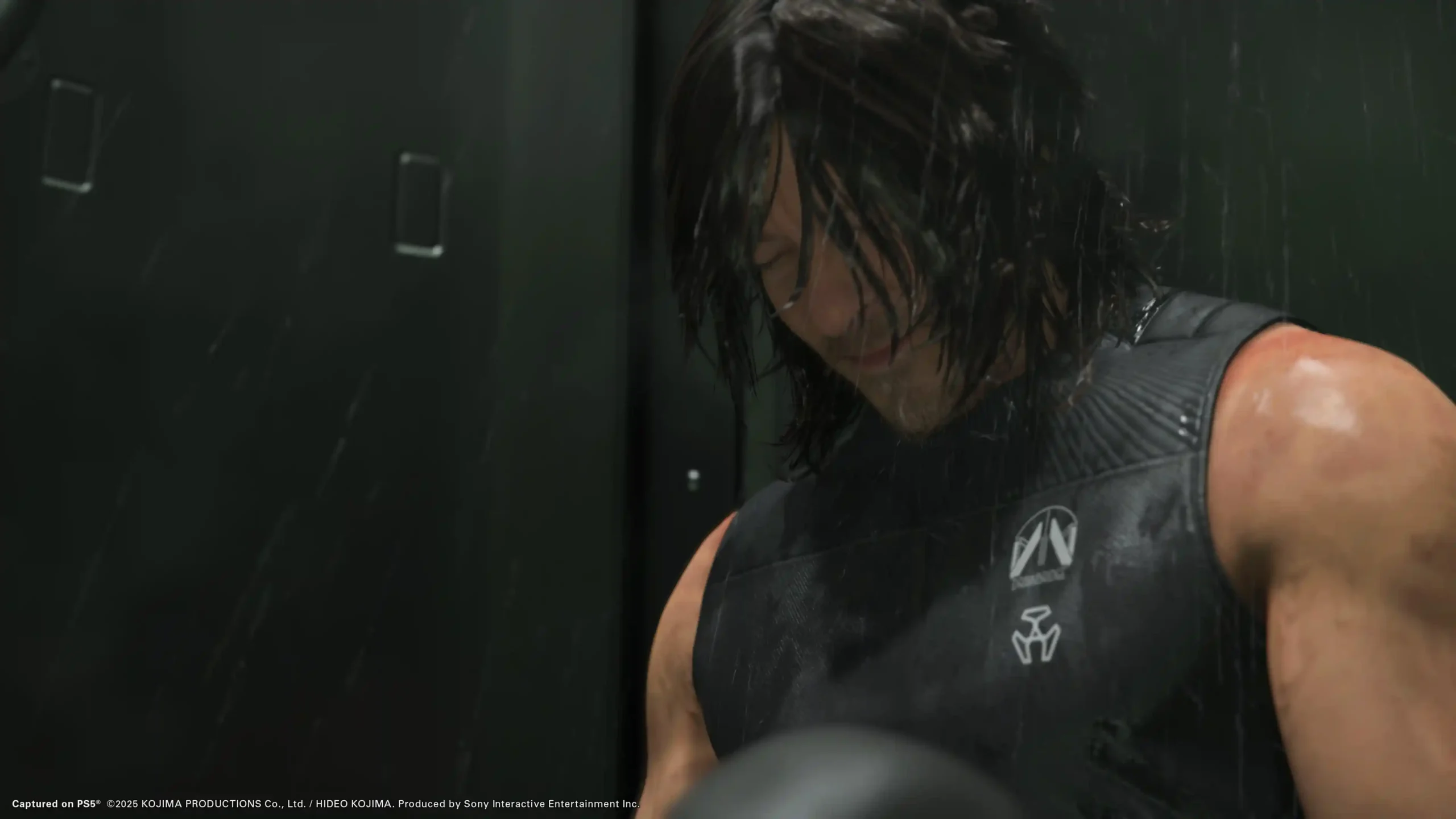 Sam Bridges in the rain wearing black suit in Death Stranding 2