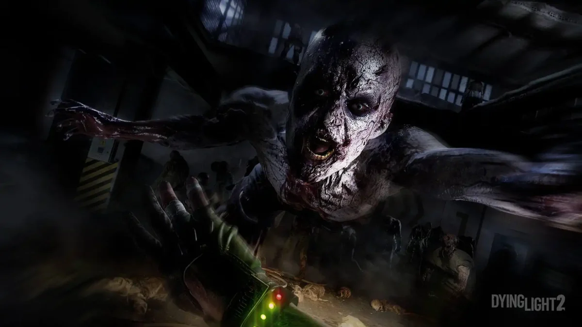 A Volatile zombie lunges at the player in a dark, claustrophobic room in Dying Light: The Beast