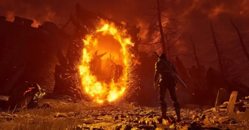 A lone warrior stands before a fiery Oblivion gate in The Elder Scrolls IV: Oblivion Remastered.