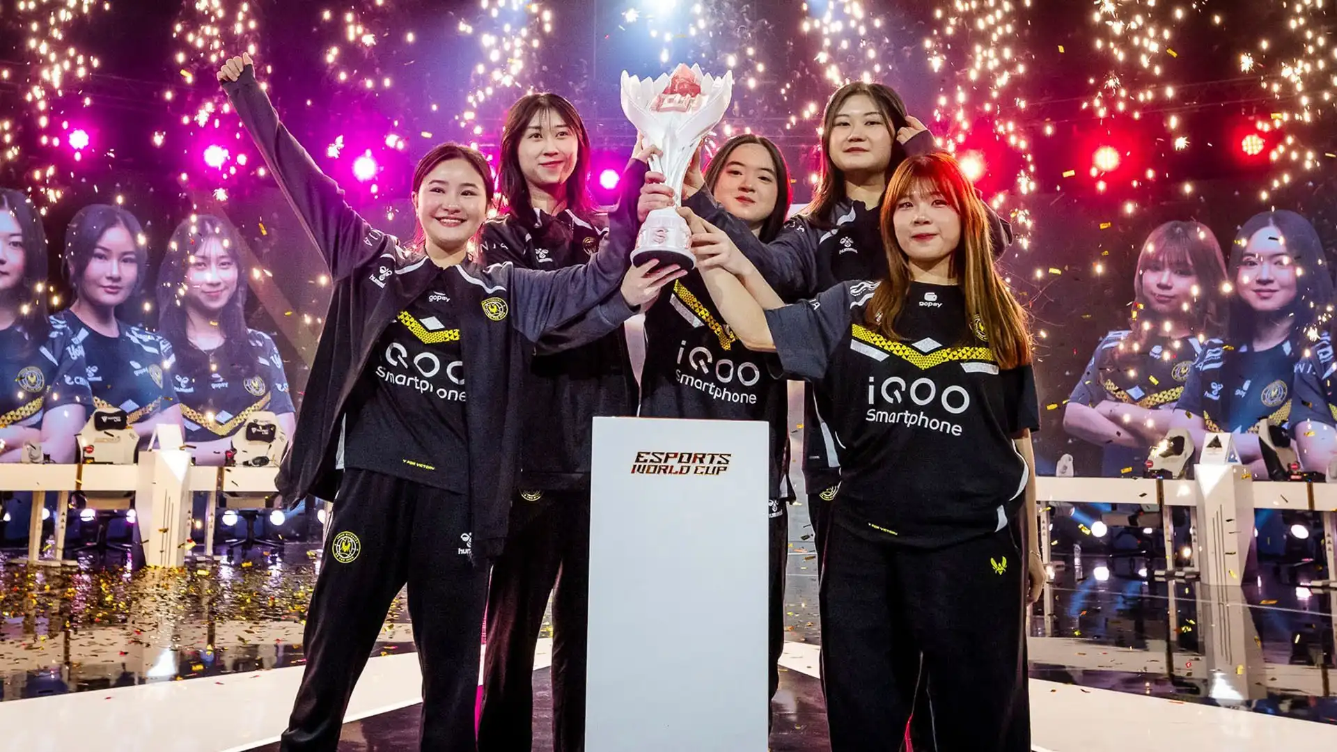 Team Vitality MLBB women's roster lifting the trophy at Esports World Cup 2025