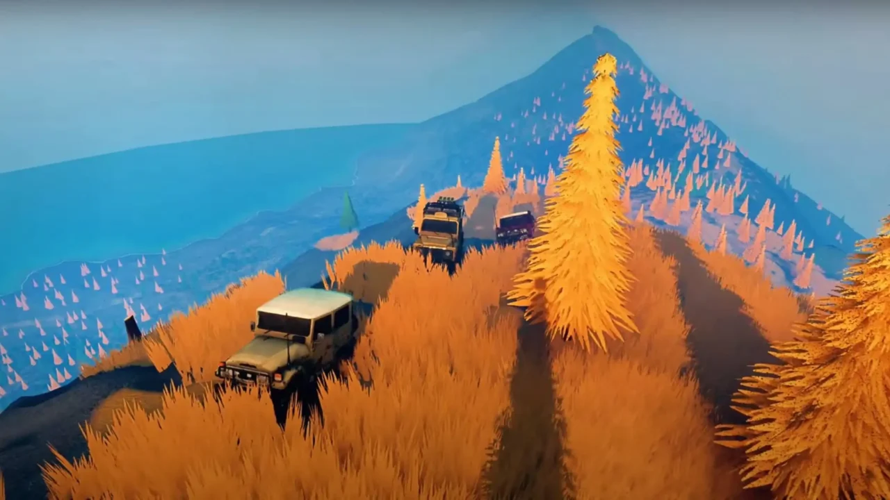 Screenshot from Over the Hill showing 3 off-road trucks on rocky terrain, one carrying colorful kayaks.