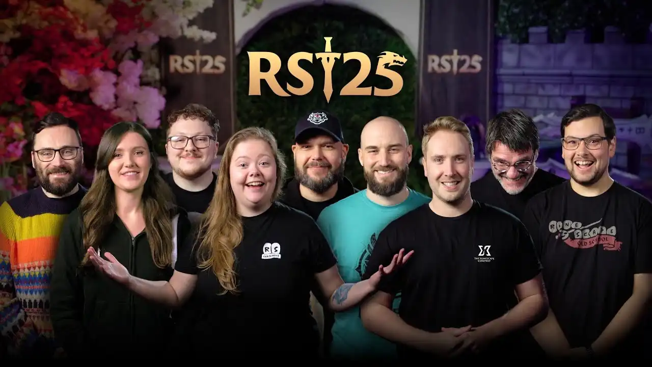 Jagex RS25 image showing a group of RuneScape team members in front of the RS25 anniversary branding
