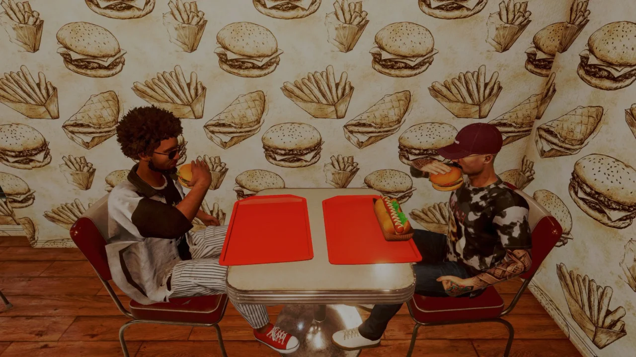 Two customers sit at a small table and eat burgers inside Corner Kitchen Fast Food Simulator.