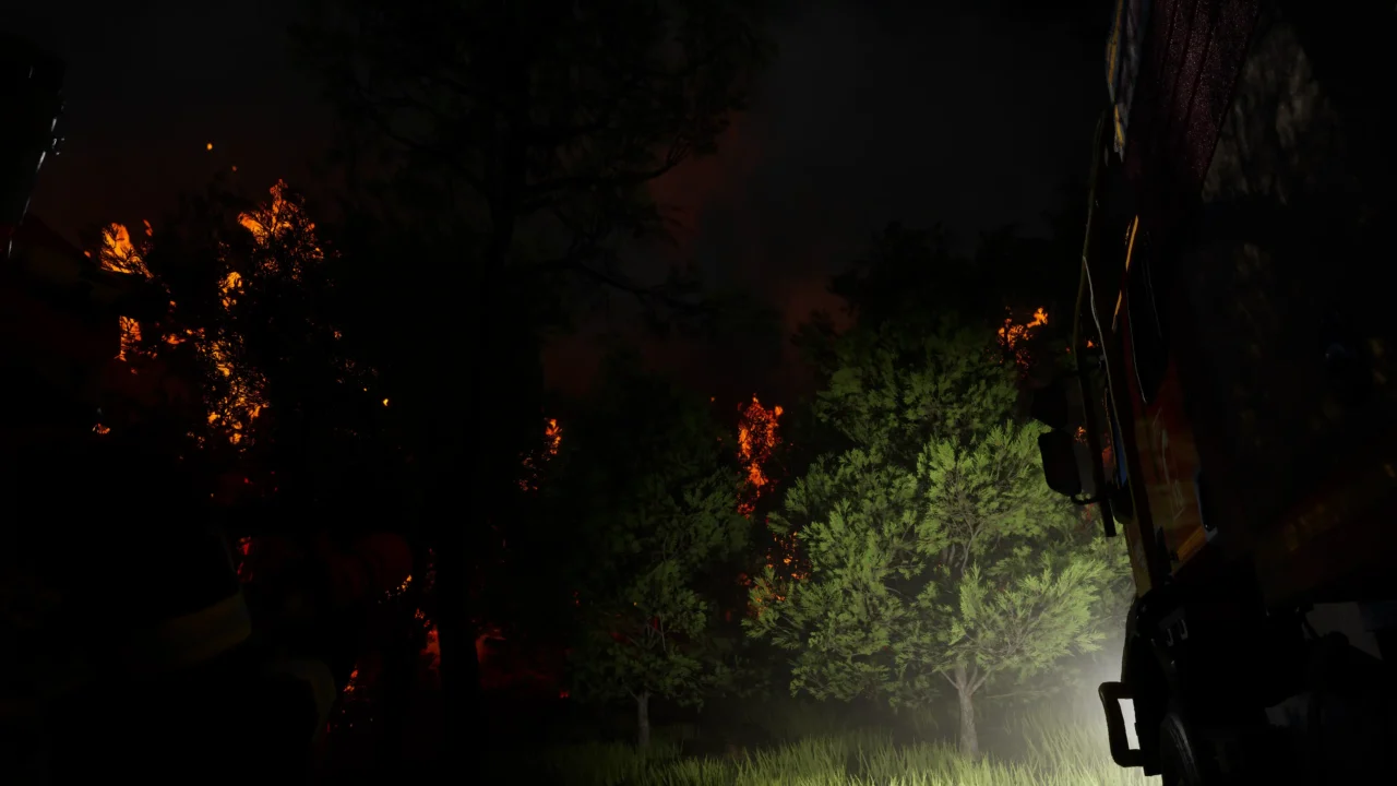 Rescue Ops: Wildfire screenshot of a night wildfire burning through a forest beside emergency vehicles.
