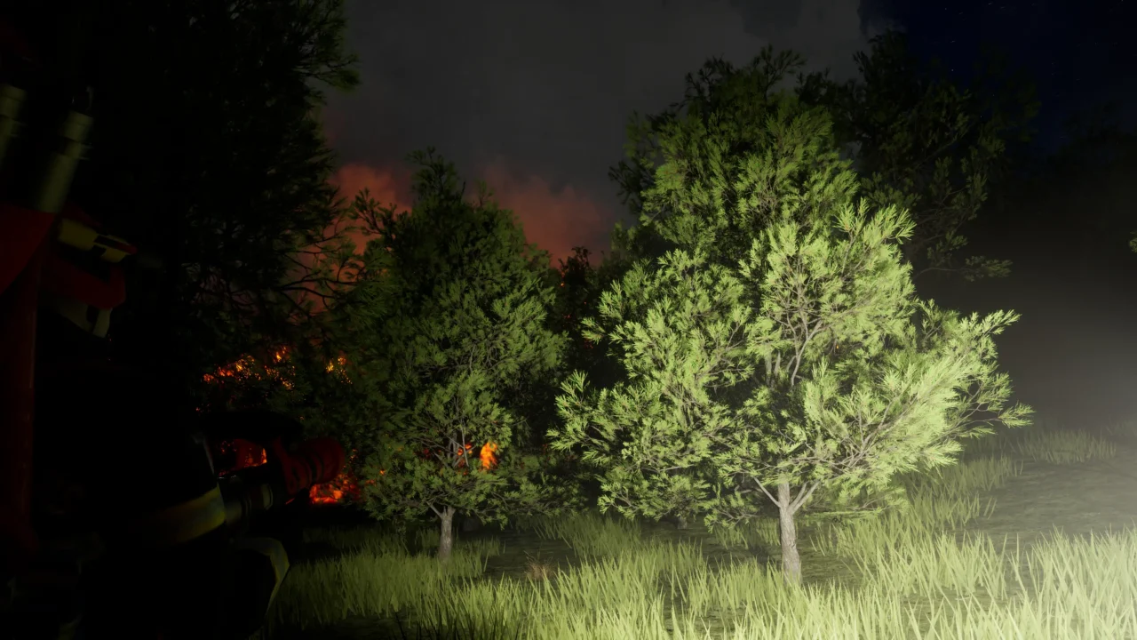 Night-time Rescue Ops: Wildfire screenshot showing a forest fire behind trees lit by a vehicle spotlight.
