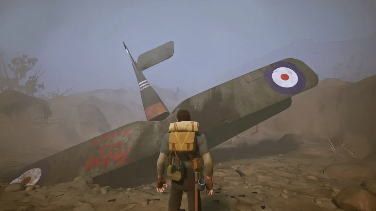The Caribou Trail screenshot showing a player standing near a crashed WWI plane with “Leave Our Home” written on the side.