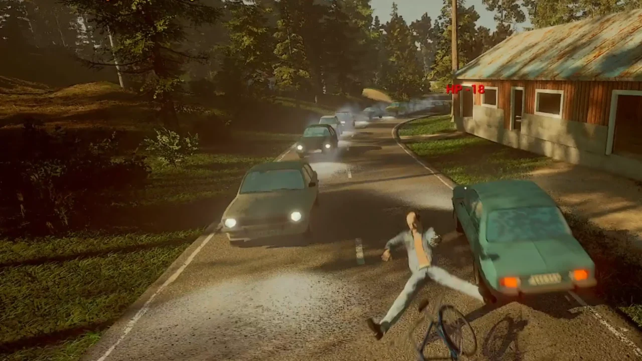 Zeze falls from his bicycle beside a car while traffic backs up on a forest road in Last Drop.