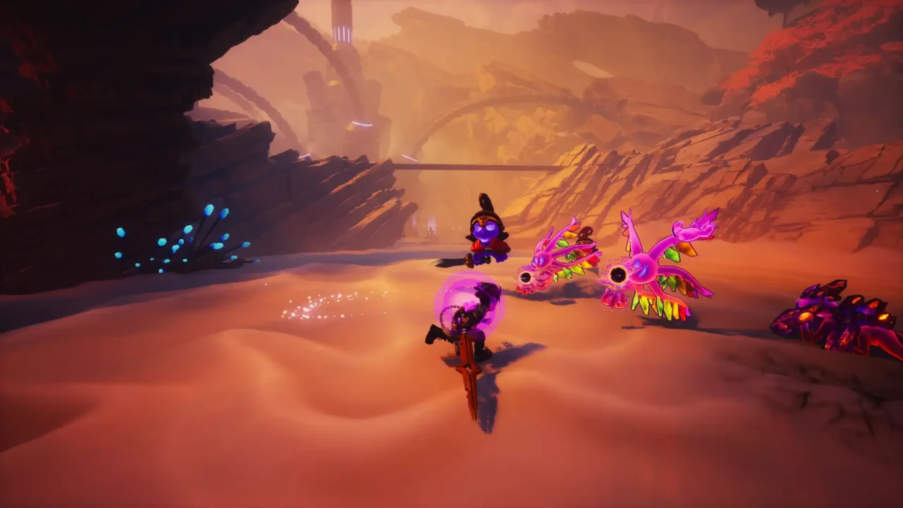 Duskfade player character fighting two bright pink flying enemies in a rocky desert area