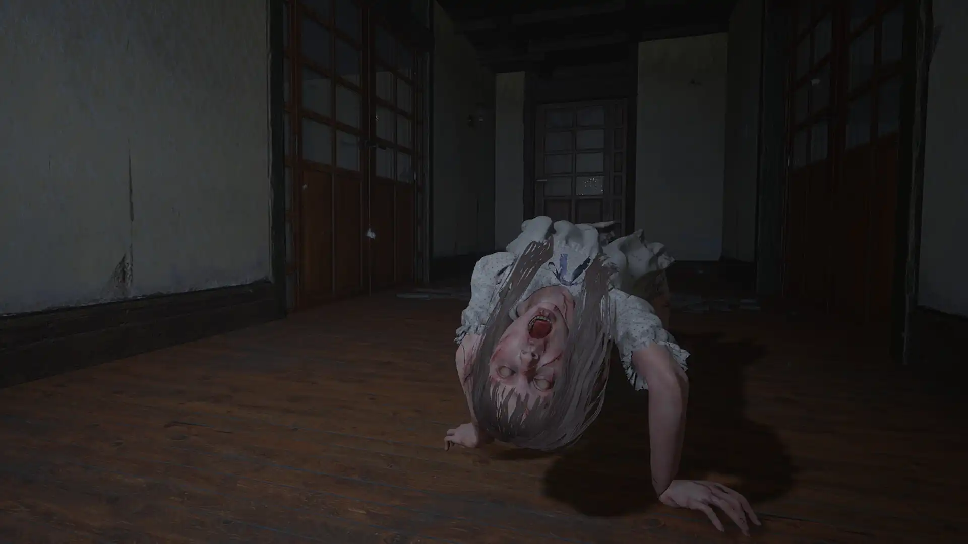 Possessed woman crawling backward through a dark hallway in Unpossess 2