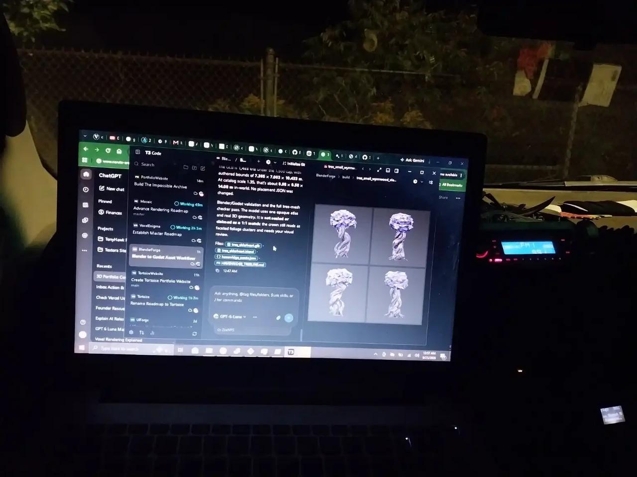 Laptop running Travis's development workspace inside a 2006 Nissan Pathfinder at night.