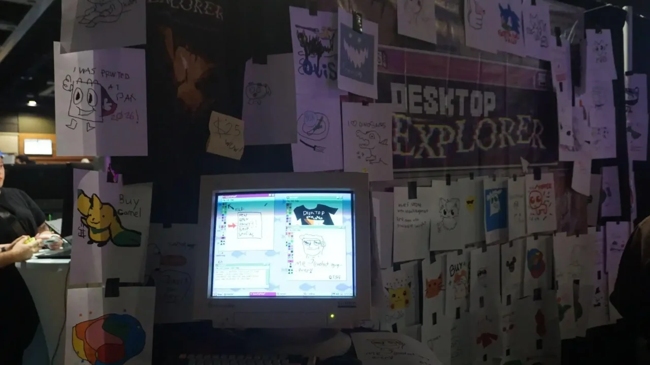 Desktop Explorer booth at PAX West 2026 covered with fan art around a retro computer display
