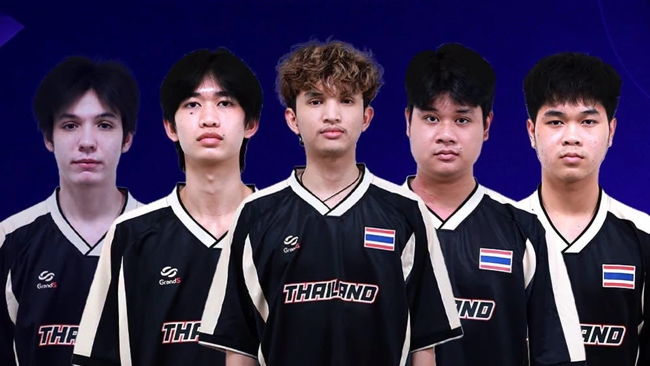 Five members of Thailand’s PUBG MOBILE team wearing black Thailand jerseys against a blue background.