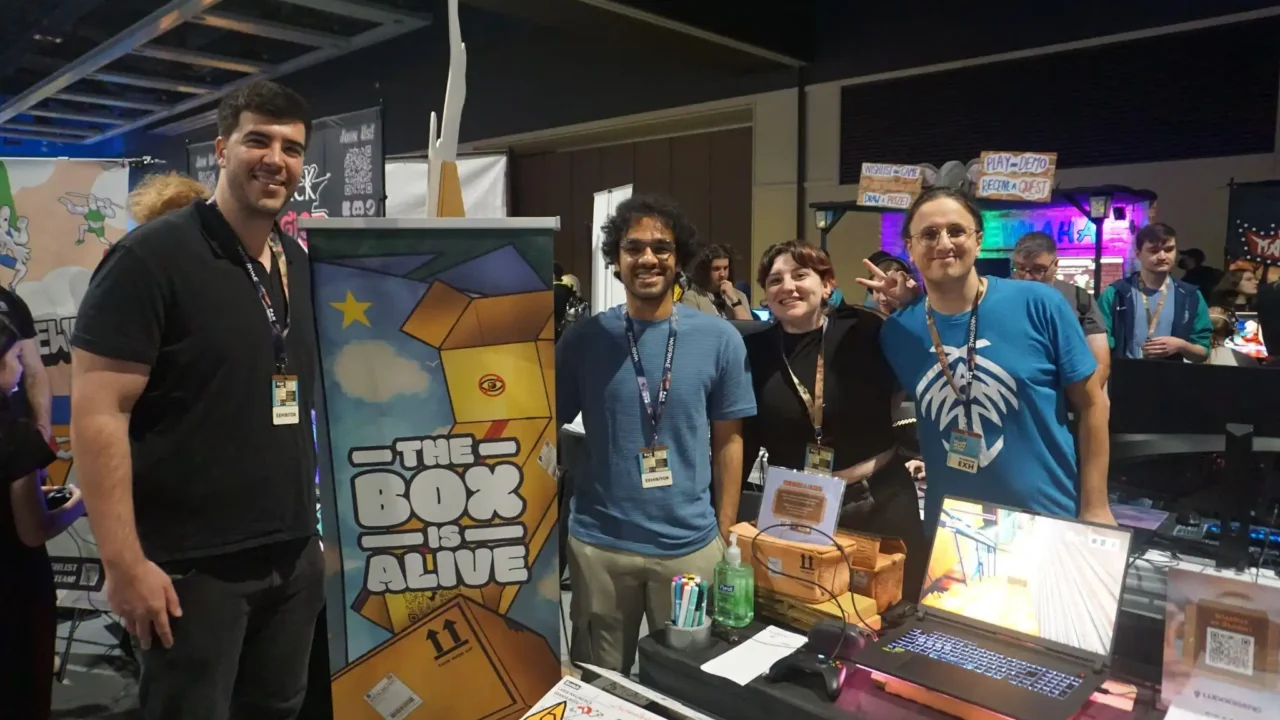 The Box Is Alive Team at PAX West 2026 The Box Is Alive development team standing beside the game booth at PAX West 2026