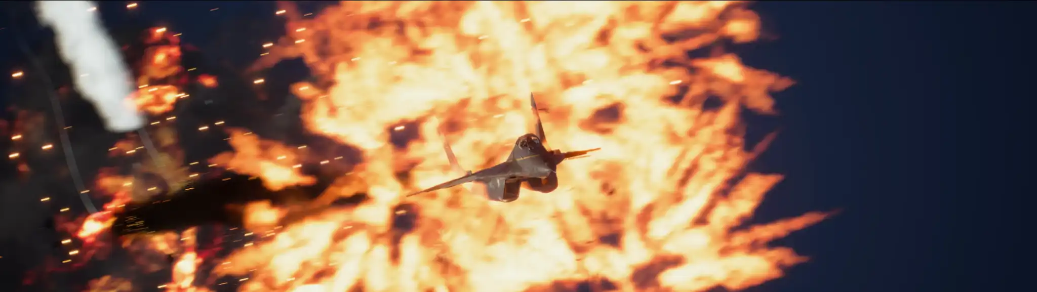 ACE COMBAT 8: WINGS OF THEVE fighter jet flying past a large explosion during 32:9 ultrawide gameplay.