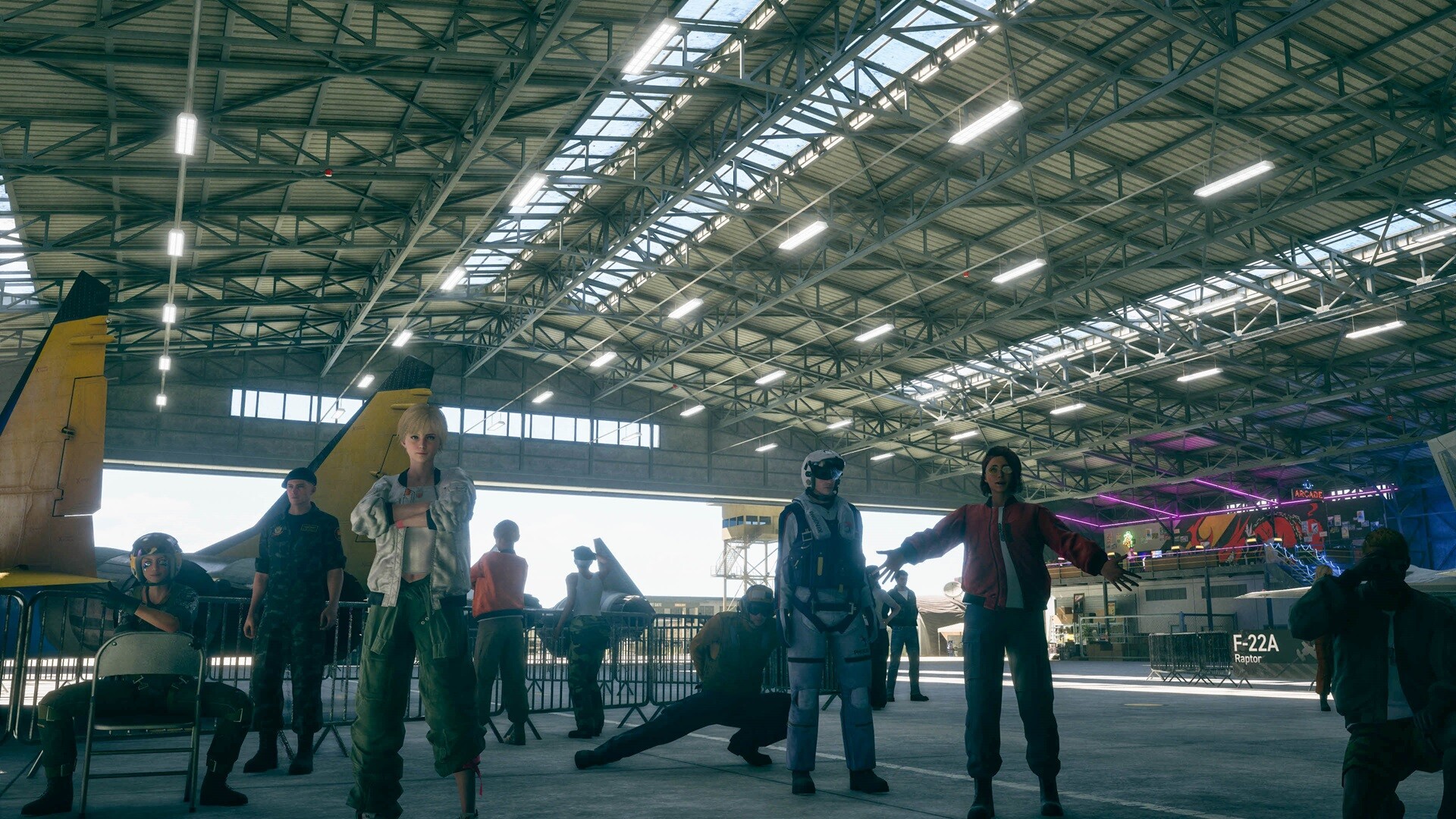 ACE COMBAT 8: WINGS OF THEVE characters standing inside a large aircraft hangar with fighter jets in the background.